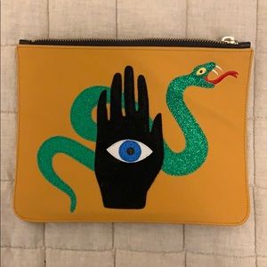 Poppy Lissiman evil eye hamsa snake clutch yellow